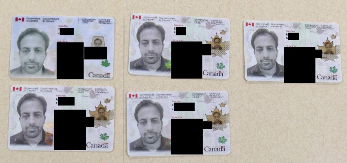 Photo of synthetic identity fraud documents.