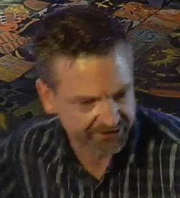 The Calgary Police Service is looking for a man who allegedly assaulted another man in the city's southeast last December.