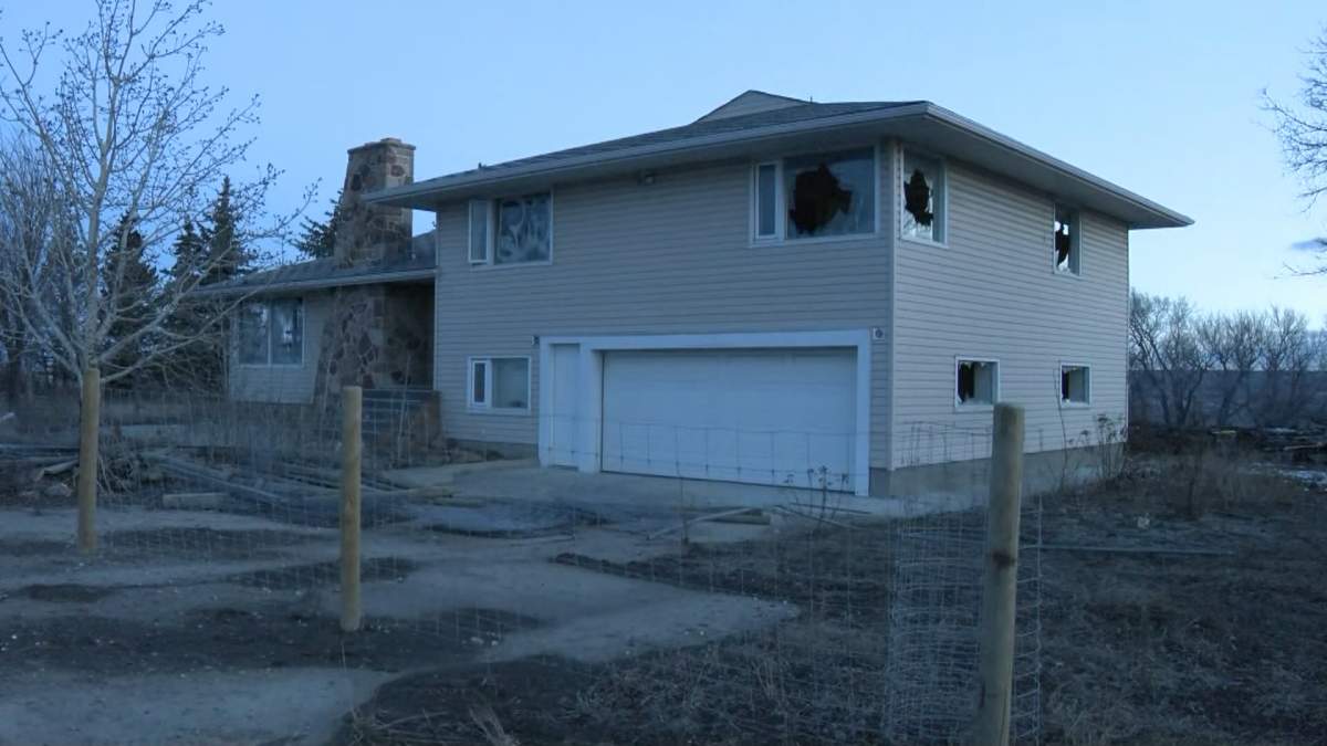 Firefighters managed to prevent a fire in a garage near Calgary from spreading to a nearby abandoned house.