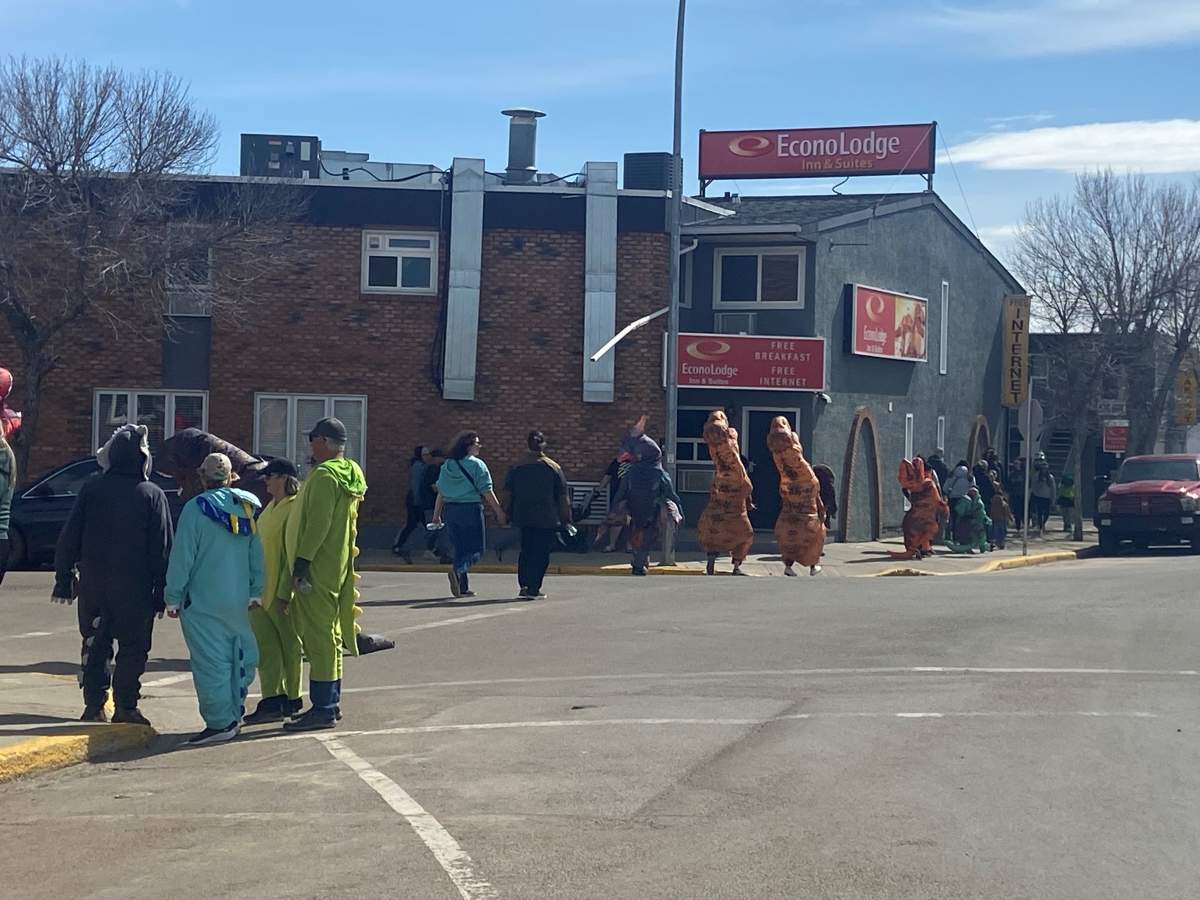 Drumheller is looking to break a world record for the most people dressed in dinosaur costumes.