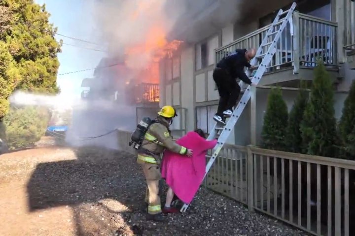 Caught on video: Woman says ‘hero’ helped save her from burning Burnaby building