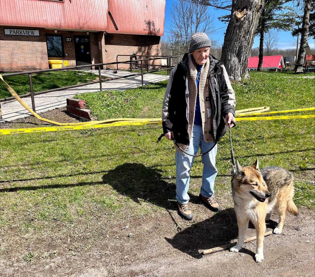 Tenant Mike Flood and his dog Baggs managed to make it out safely.