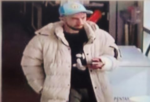 Manitoba RCMP are seeking this man and two other suspects in a large-scale electronics theft from a Portage la Prairie business.