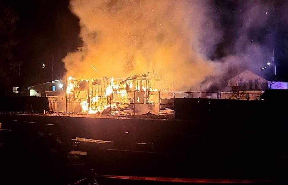 Flames left a detached garage in Kelowna badly damaged Saturday night.