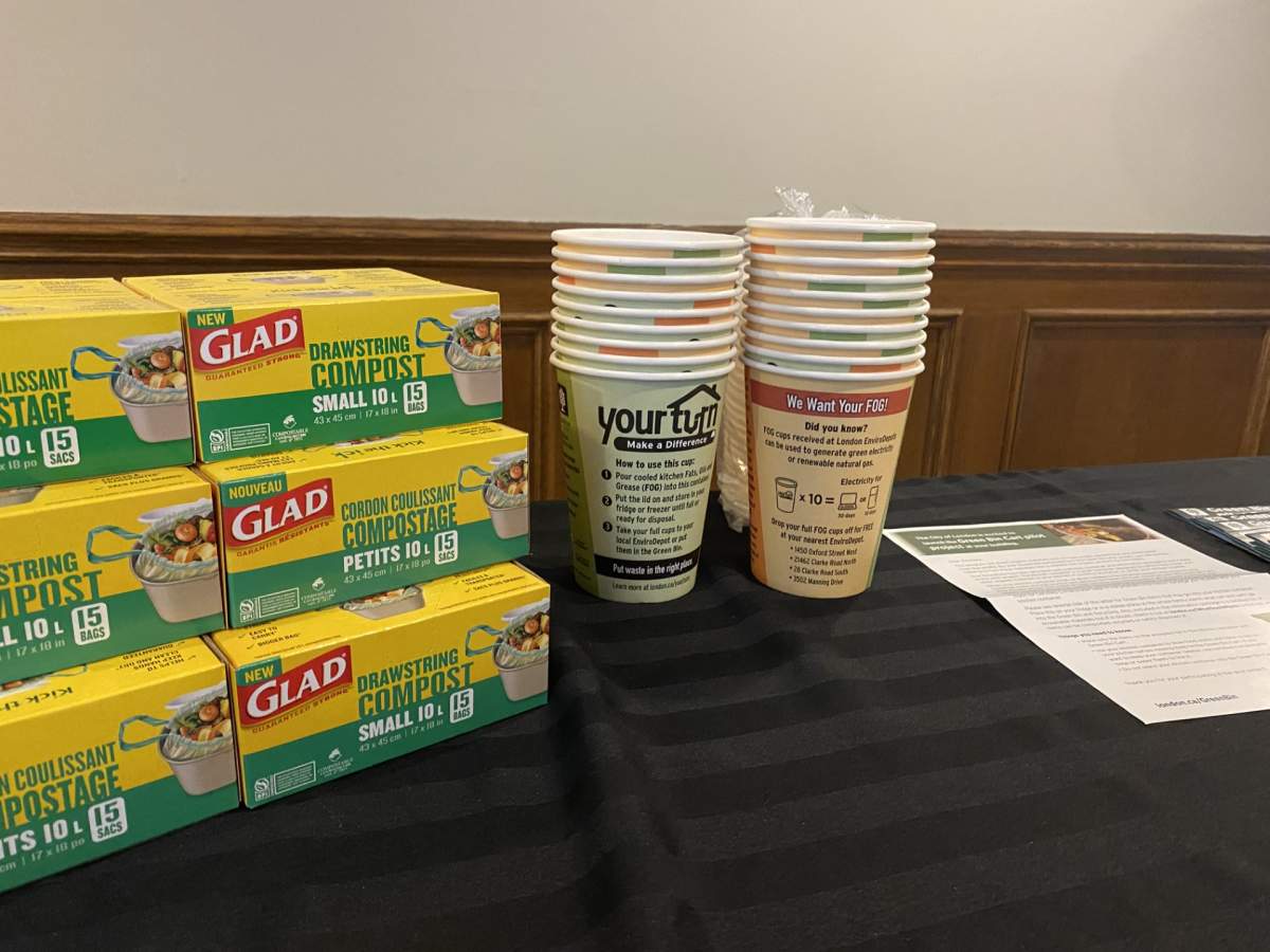 Food waste containers for grease, to avoid pouring down drains (right), and the bags allowed in green bins (left).