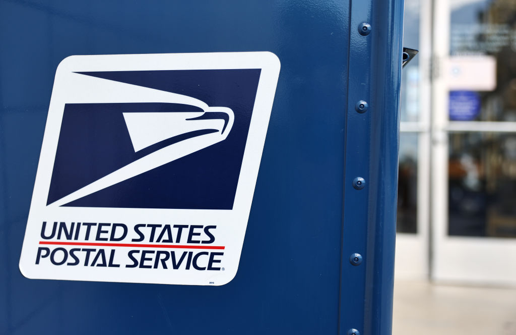 A United States Postal Service logo is displayed on a U.S. Post Office mailbox on April 1, 2024 in Montclair, California.