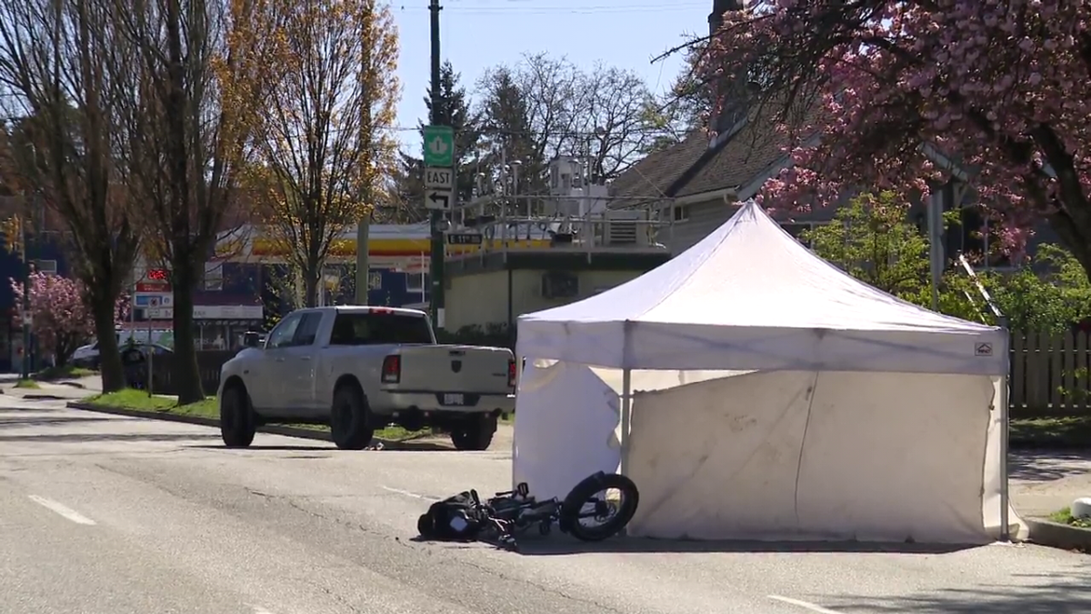 The scene of a fatal collision between a cyclist and a pickup truck in East Vancouver on Wednesday.