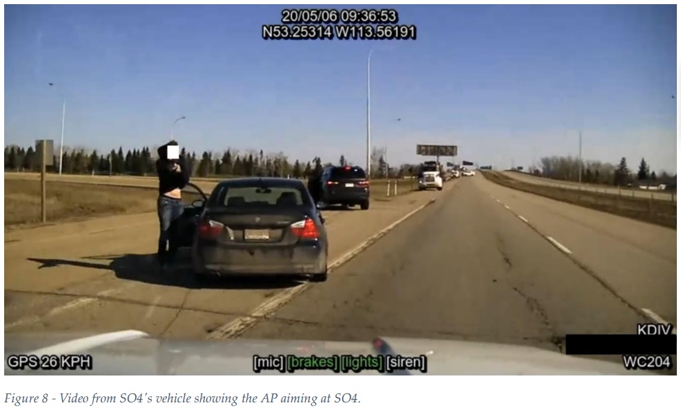 Police vehicle photo shows man pointing firearm at RCMP on May 6, 2020 near Leduc.