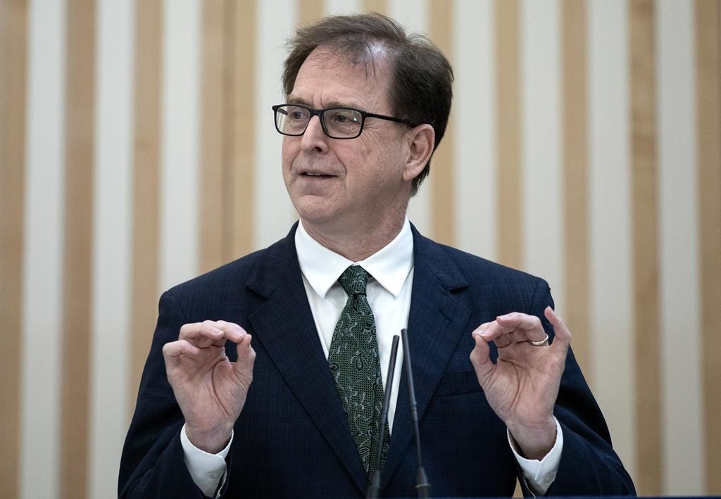 British Columbia Health Minister Adrian Dix says the province is providing more funding to recruit and retain more health-care workers. Dix speaks during an announcement at the Royal Inland Hospital in Kamloops, B.C., on Thursday, Feb. 8, 2023. THE CANADIAN PRESS/Marissa Tiel.