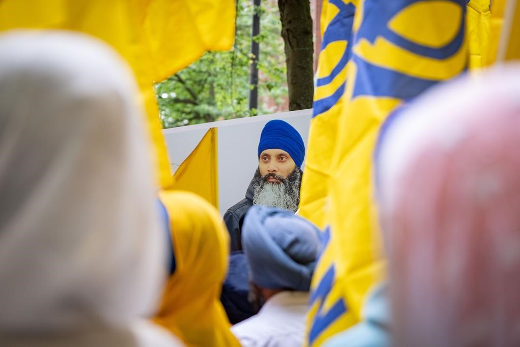 Poster of slain B.C. temple leader Hardeep Singh Nijjar, gunned down in a killing blamed on the Indian government. THE CANADIAN PRESS/Ethan Cairns.