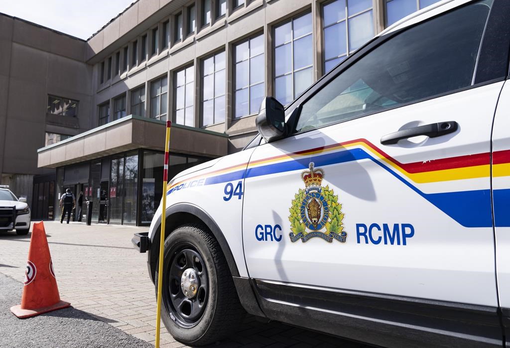 Mounties are looking for a driver involved in a hit-and-run in Airdrie that happened at noon on Friday. RCMP vehicle signage is shown in Montreal, Thursday, March 7, 2024. THE CANADIAN PRESS/Christinne Muschi.