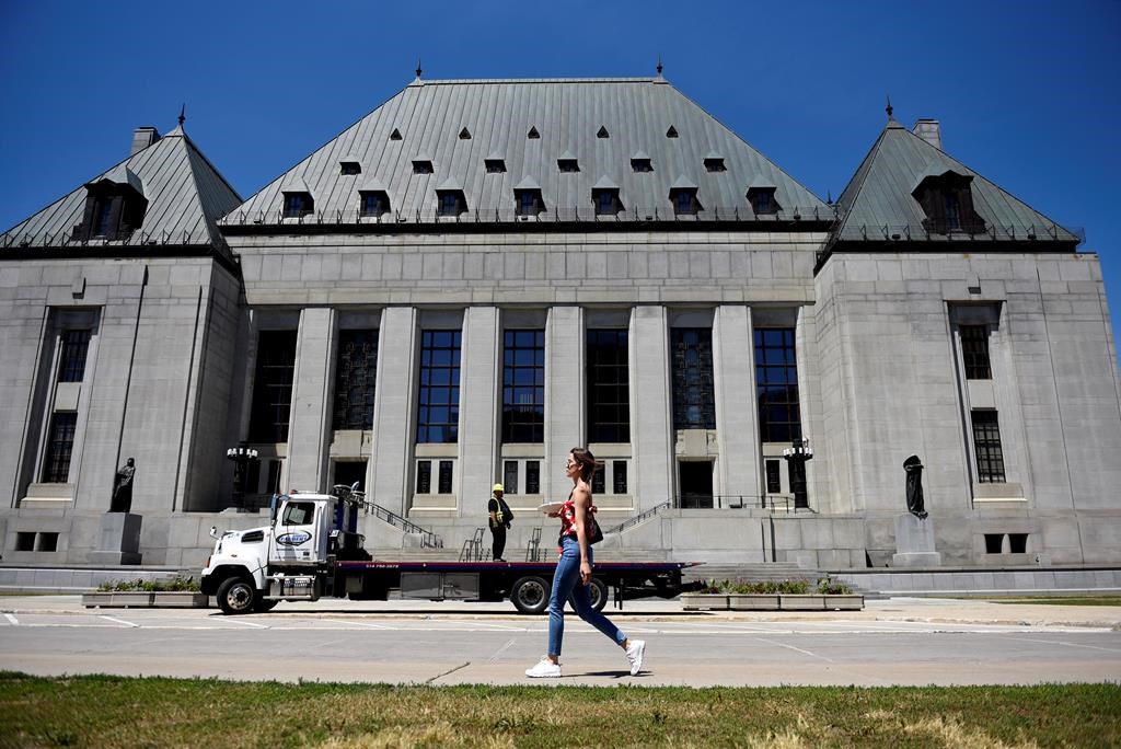 The Supreme Court of Canada has dismissed a bid by the City of Saint John to overturn a lower court ruling that found the city vicariously liable for the sexual abuse of children by a member of the Saint John Police Force. The Supreme Court of Canada building is seen in Ottawa, on Thursday, June 17, 2021. THE CANADIAN PRESS/Justin Tang.