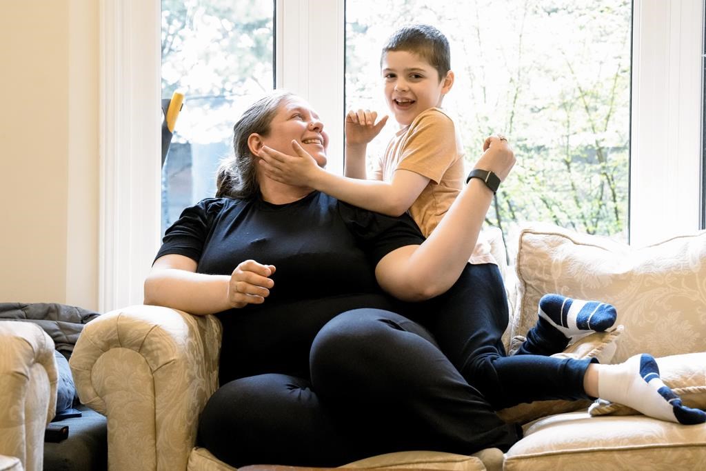 Alexis Wilson is photographed at home with her seven-year-old son Emmett, who has severe autism, in Thornhill, Ont., on Tuesday, April 30, 2024. 