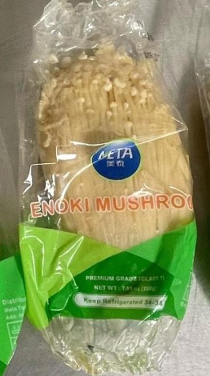 Meta brand enoki mushrooms are shown in this undated handout photo. The Canadian Food Inspection Agency has announced a recall of Meta brand enoki mushrooms due to possible Listeria contamination.