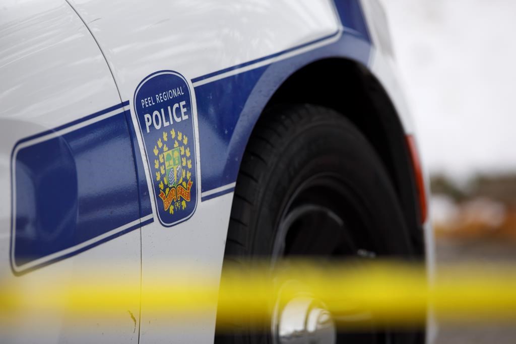 Responding officers say calls reporting the incident came in around 10:52 p.m. Peel Regional Police logo is shown on a vehicle in Brampton, Ont., on Thursday, Nov. 7, 2019.