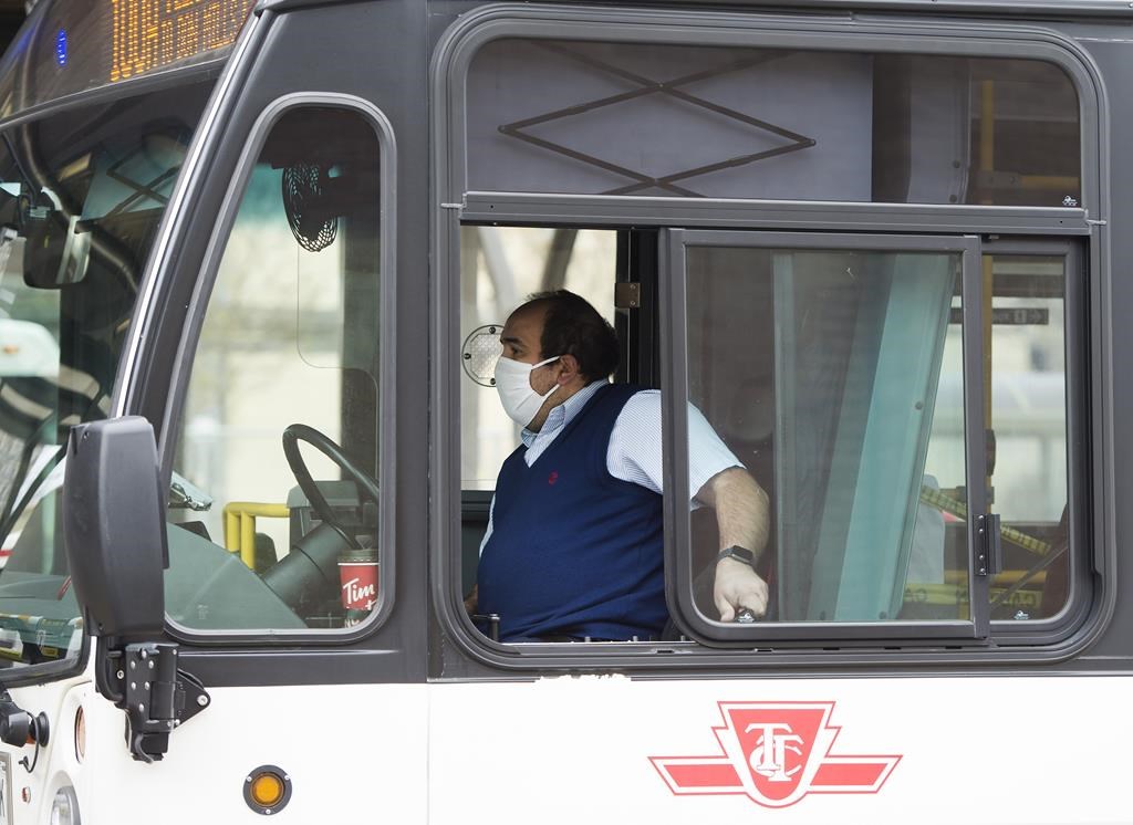 Ontario's top court has upheld the right of Toronto Transit Commission workers to strike, a decision that comes just days before potential job action. A TTC driver operates a bus in Toronto on Thursday, April 23, 2020. 