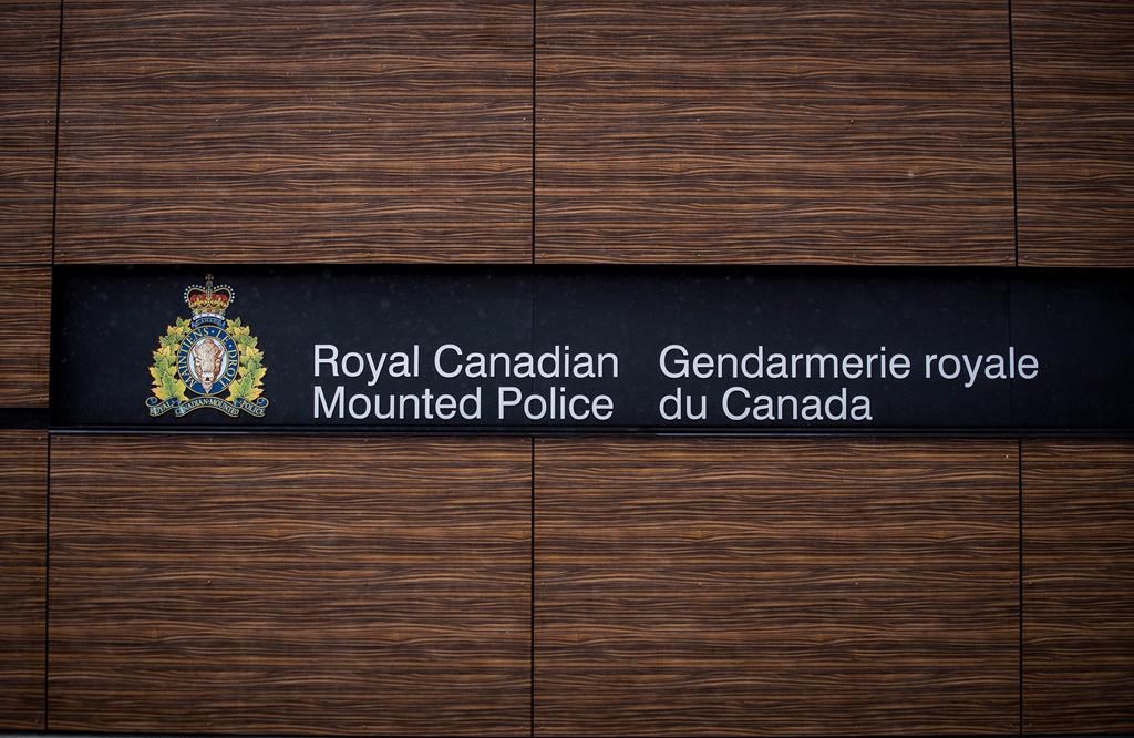 The RCMP logo is seen outside Royal Canadian Mounted Police "E" Division Headquarters, in Surrey, B.C., on Friday April 13, 2018.