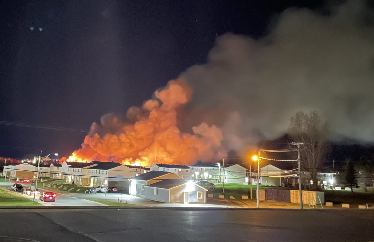The blaze broke out at an Eddy Group location, a building materials store that sells plumbing, HVAC, and electrical supplies. The Bathurst, N.B., fire department initially put out a statement about the fire at 9:56 p.m. on Saturday, advising people to avoid the area. Photo credit: Peter M. Jarratt.