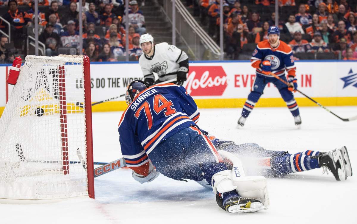 Los Angeles Kings' Alex Laferriere (78) scores a goal on Edmonton Oilers goalie Stuart Skinner (74) during first period NHL playoff action in Edmonton on Wednesday May 1, 2024.