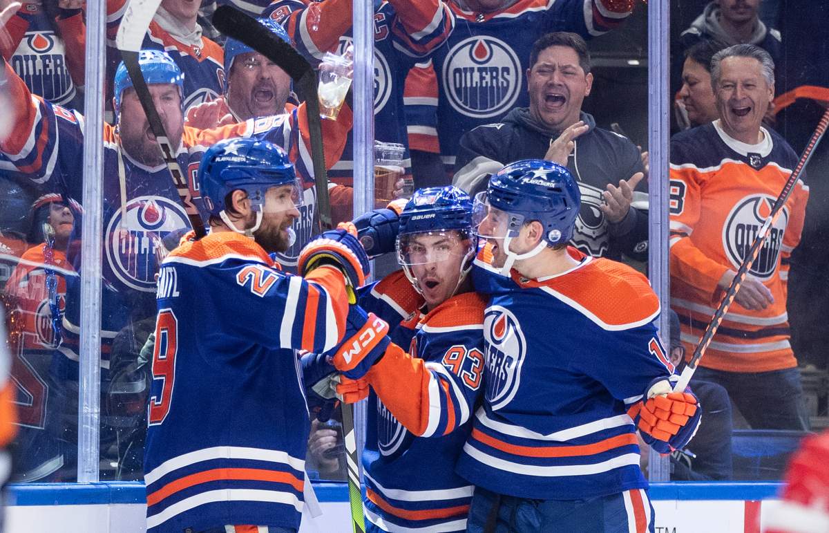 Edmonton Oilers' Leon Draisaitl (29), Ryan Nugent-Hopkins (93) and Zach Hyman (18) celebrate a goal against the Los Angeles Kings during second period NHL playoff action in Edmonton on Wednesday May 1, 2024.