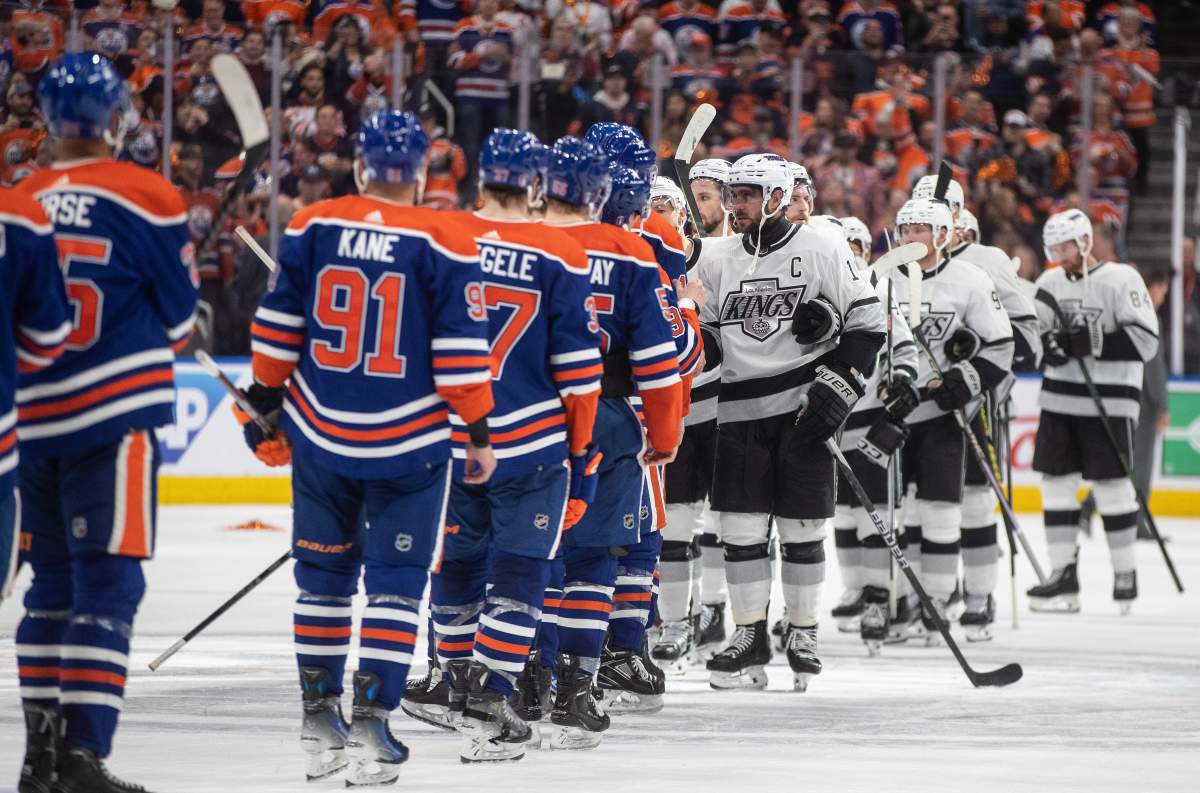 Los Angeles Kings and the Edmonton Oilers shake hands after the Oilers won the series four games to one during NHL playoff action in Edmonton on Wednesday May 1, 2024.