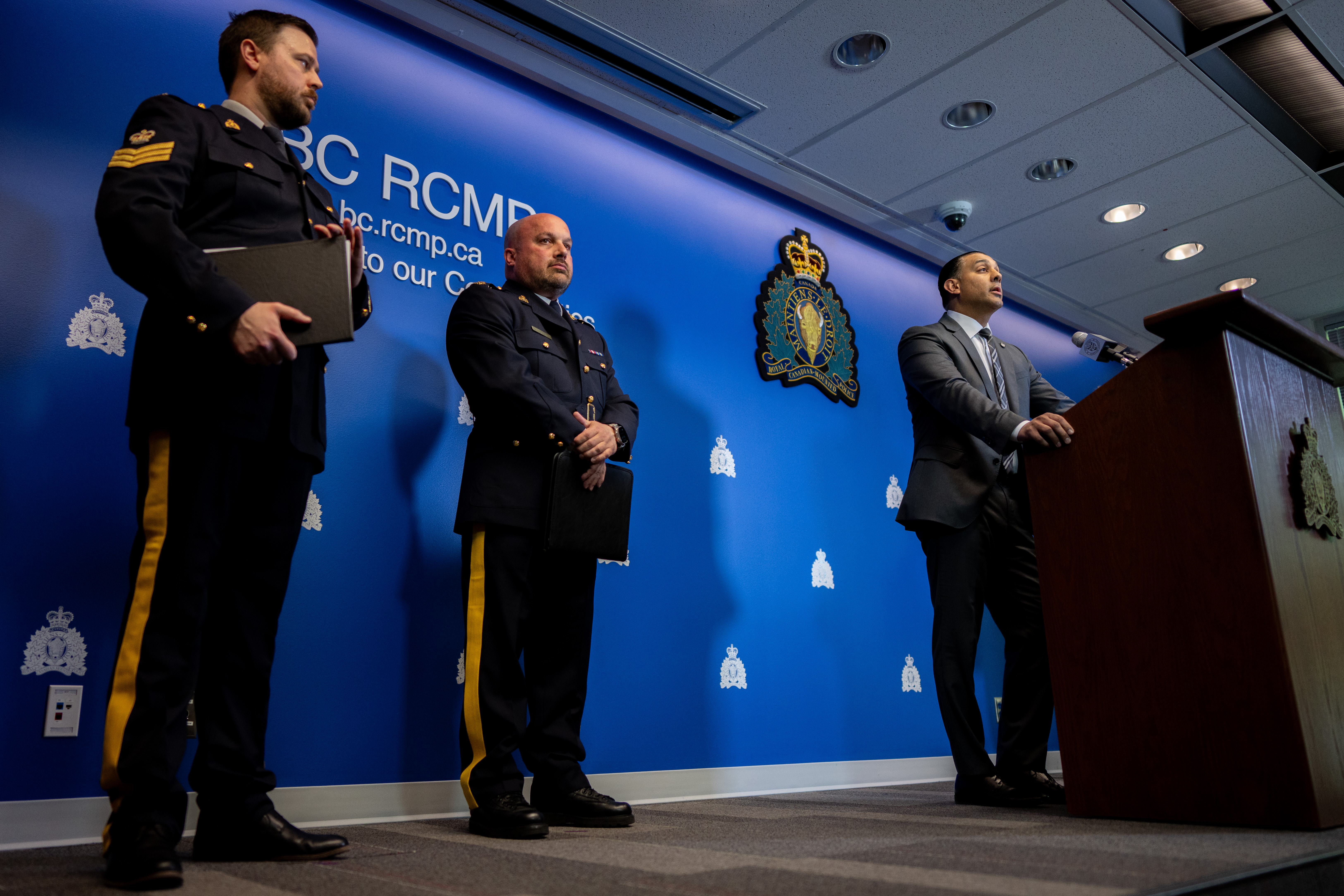 Superintendent Mandeep Mooker, right, Assistant Commissioner David Teboul, centre, at news conference on Hardeep Singh Nijjar homicide, iMay 3, 2024. THE CANADIAN PRESS/Ethan Cairns