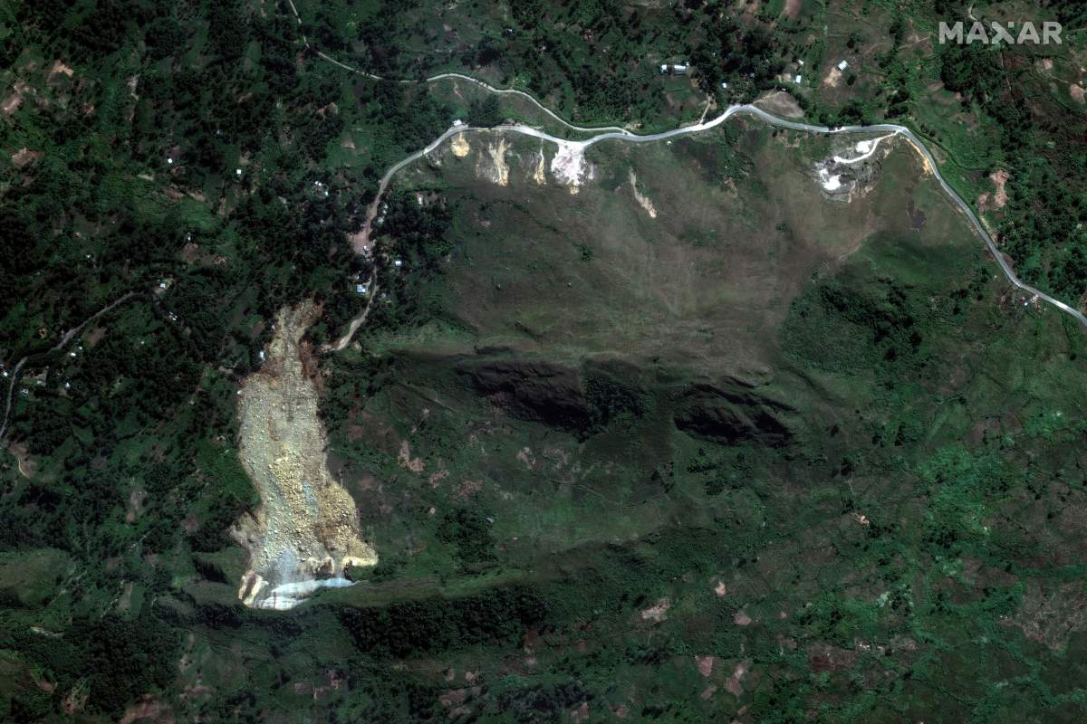 This May 27, 2024, satellite image provided by Maxar Technologies shows the recent landslide in the Enga region of northern Papua New Guinea that killed and wounded hundreds of people and buried part of the Yambali village. (Maxar Technologies via AP)