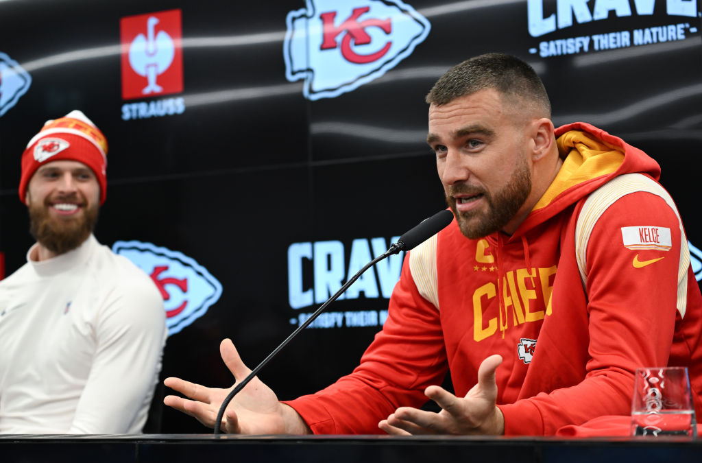 Travis Kelce speaks next to kicker Harrison Butker during the press conference on the DFB Campus.