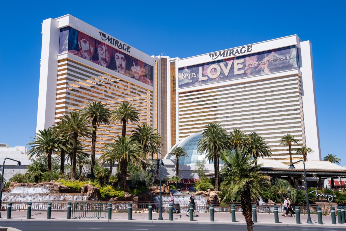 The Mirage hotel-casino. There is a banner ad around the building for the Beatles Love Cirque show.