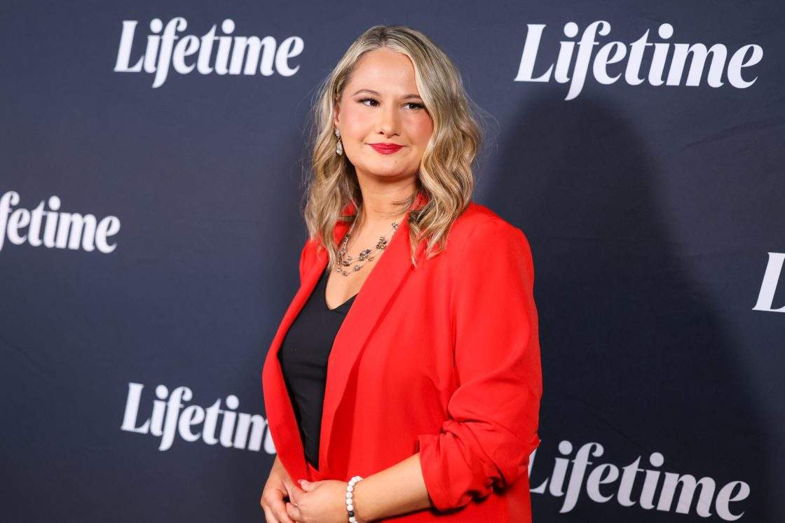 Gypsy Rose Blanchard in a red blazer, red lipstick and a black shirt.