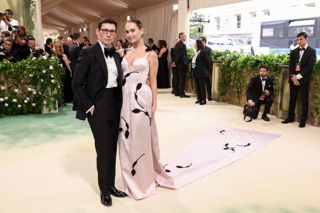 Erdem Moralıoğlu and Lily James attend The 2024 Met Gala Celebrating "Sleeping Beauties: Reawakening Fashion" at The Metropolitan Museum of Art on May 06, 2024 in New York City.