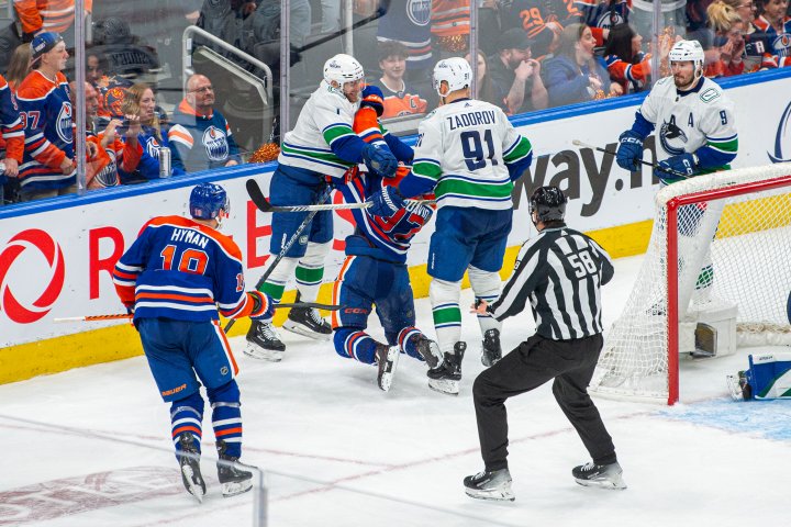 Canucks defenceman Nikita Zadorov fined for cross-checking Oilers Connor McDavid