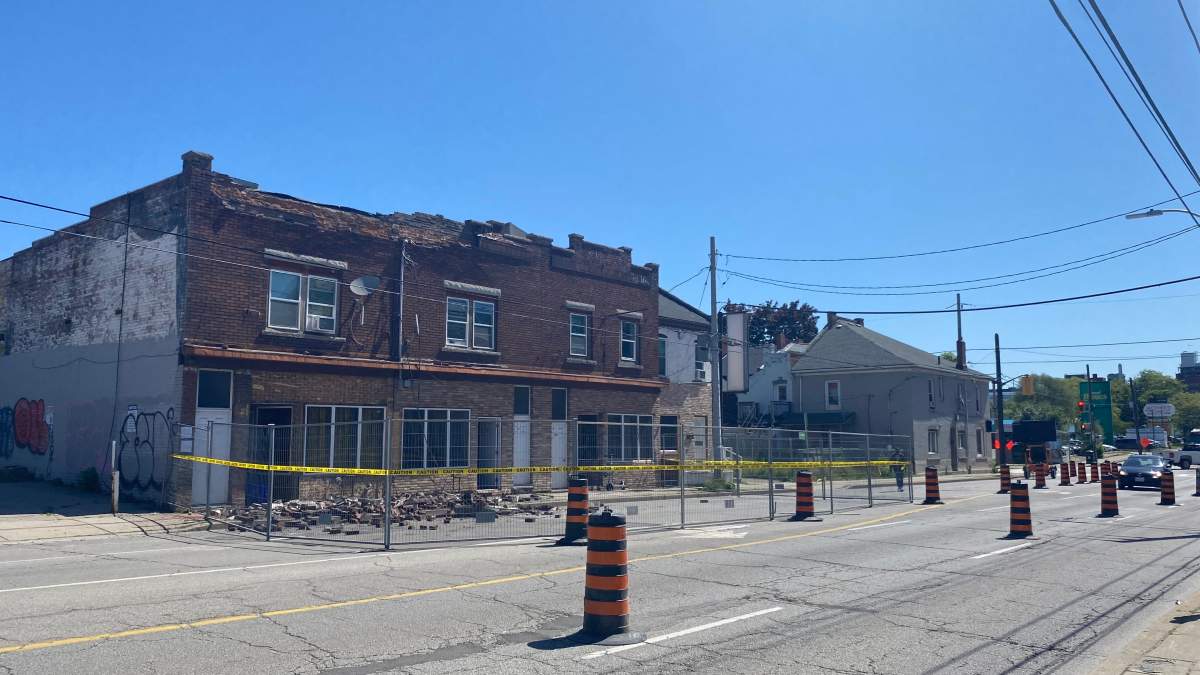 Photo of a building on Barton Street East in Hamilton, Ont. with debris from the structure's facade.