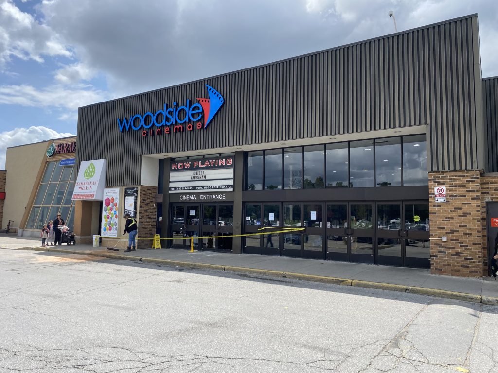 Police tape can be seen outside of a movie theatre in Scarborough.