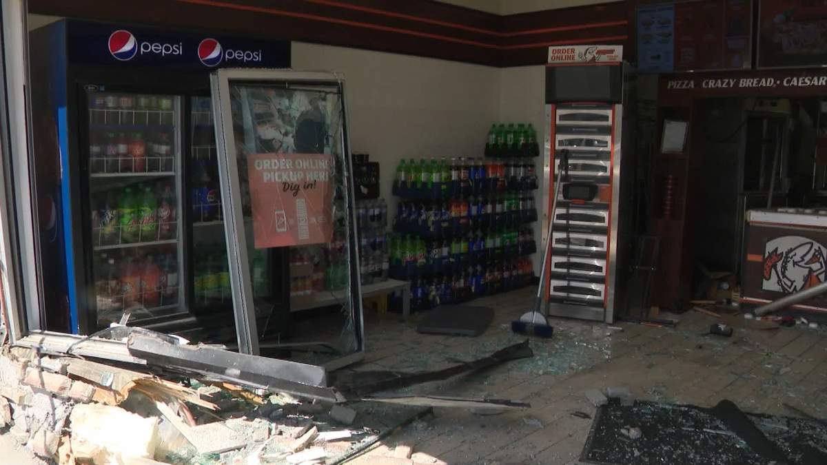 No injuries were reported when a vehicle crashed into Little Caesars Pizza at 18 Panatella Blvd. Northwest in Calgary Thursday, May 16, 2024.
