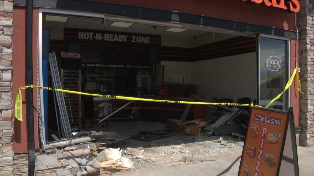 No injuries were reported when a vehicle crashed into Little Caesars Pizza at 18 Panatella Blvd. Northwest in Calgary Thursday, May 16, 2024.