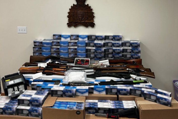 La Ronge man charged after 110K illegal cigarettes, weapons seized in bust: RCMP