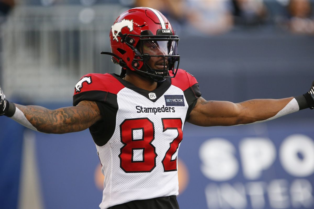 Calgary Stampeders' Malik Henry (82) celebrates his touchdown against the Winnipeg Blue Bombers during the first half CFL action in Winnipeg Thursday, August 25, 2022.