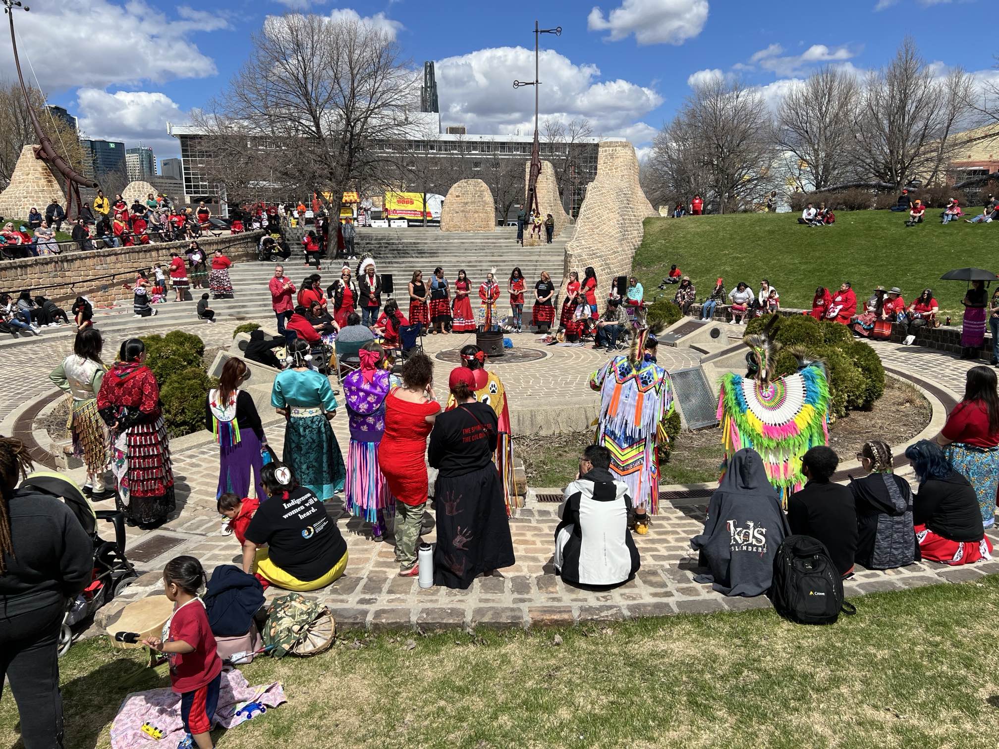 Dozens gather to mark Red Dress Day in Winnipeg