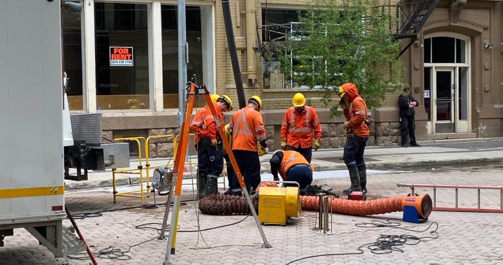 Hydro crews work to restore power to downtown Winnipeg following underground fire