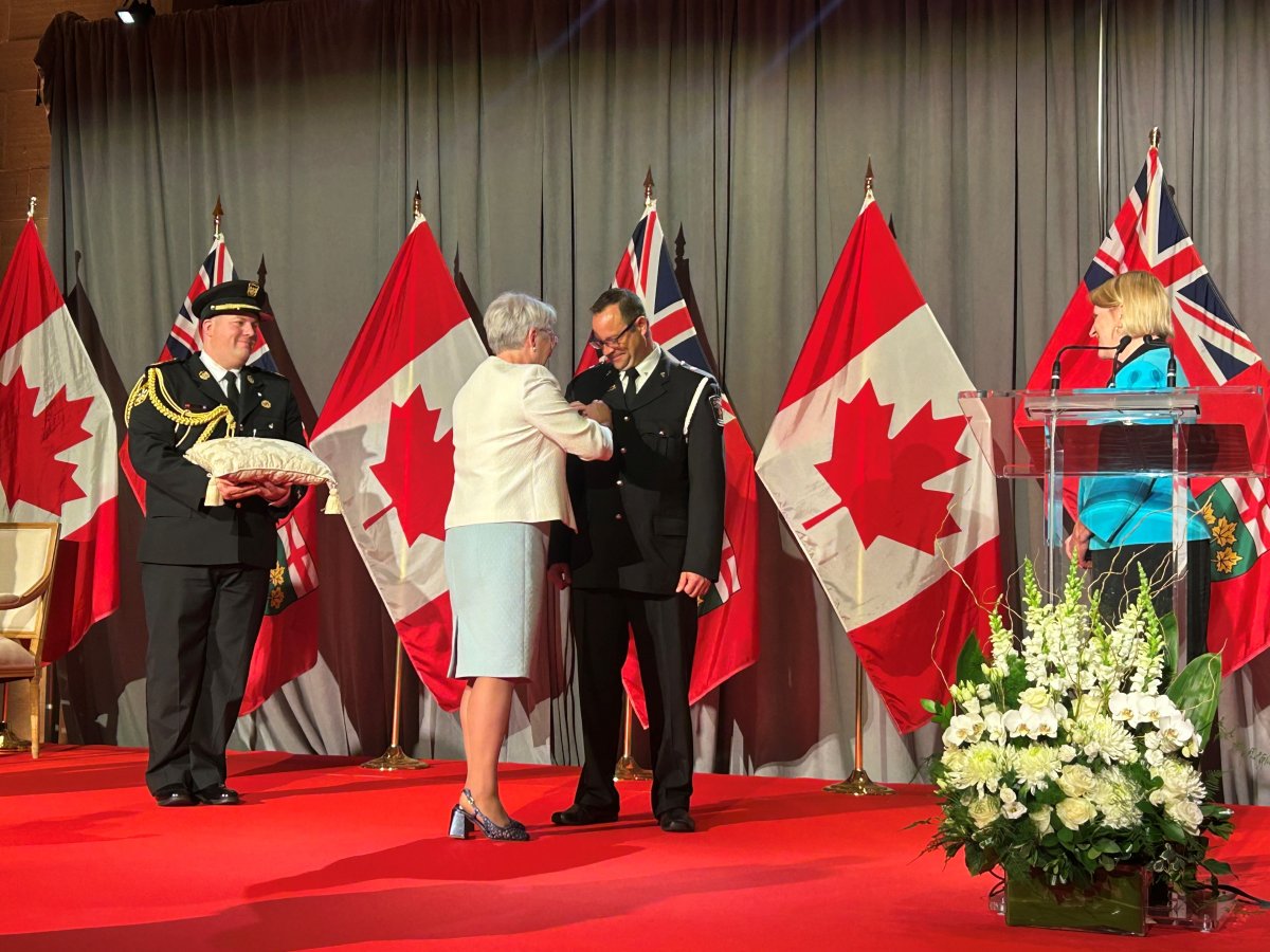 Paramedic Geoff D’Eon receiving the Ontario Medal for Paramedic Bravery from The Hon. Edith Dumont, Lieutenant Governor of Ontario.