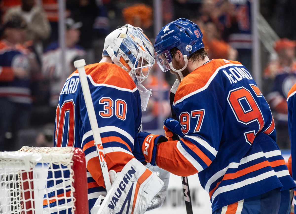 Edmonton Oilers goalie Calvin Pickard (30) and Connor McDavid (97) celebrate the win over the Vancouver Canucks during second-round NHL playoff action in Edmonton on Tuesday May 14, 2024.
