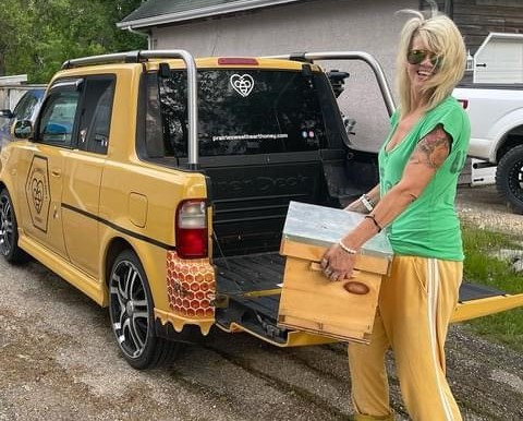 Rebecca Krowelski with her honeybees.