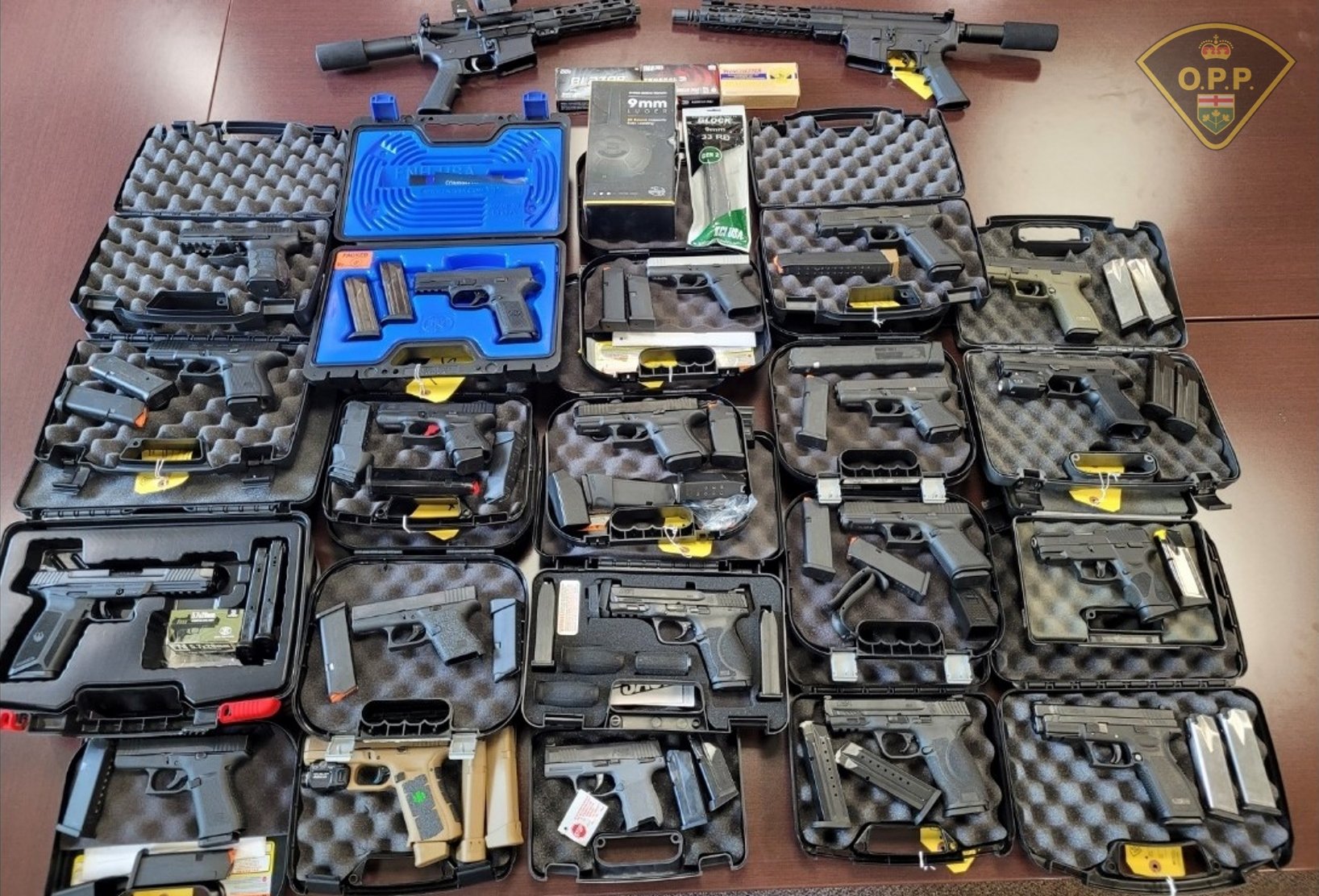 3 suitcases of firearms seized after being smuggled from U.S. into Ontario - Vimarsana News