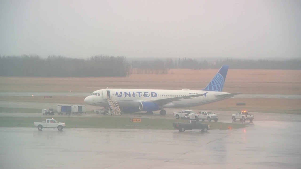 Plane wheel gets stuck in mud at Edmonton International Airport