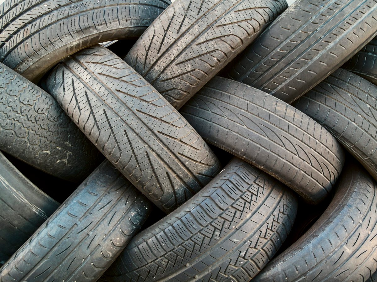 A stack of used vehicle tires.