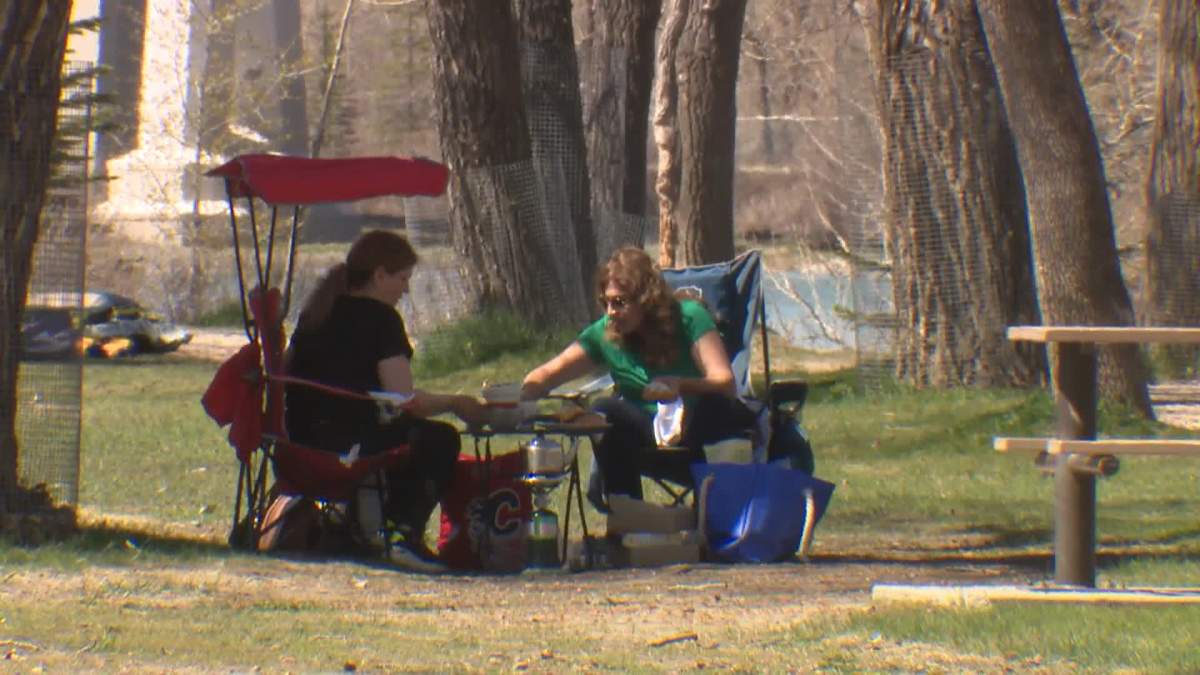 The unseasonably warm weather forecast for much of Alberta this weekend means there could be lots of families enjoying a picnic like these ones on Friday in Bowness Park.