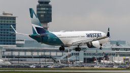 A WestJet Boeing 737-8 MAX (C-GLWS) lands at Vancouver International Airport, Richmond, B.C., on Saturday, April 20, 2024
