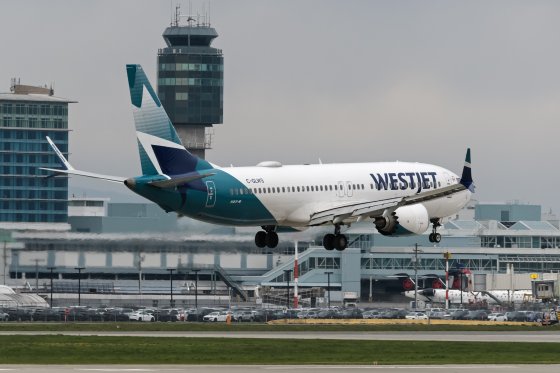 A WestJet Boeing 737-8 MAX (C-GLWS) lands at Vancouver International Airport, Richmond, B.C., on Saturday, April 20, 2024