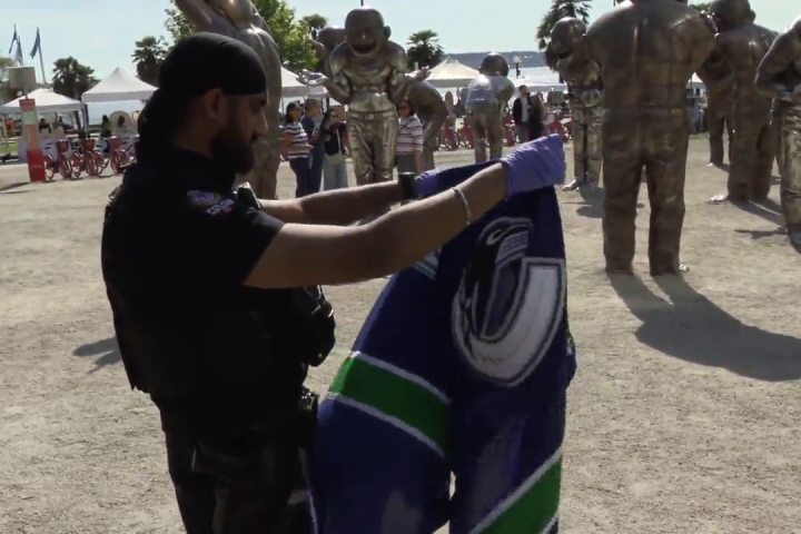 Arson won’t stop duo who decked Vancouver sculptures in Canucks jerseys